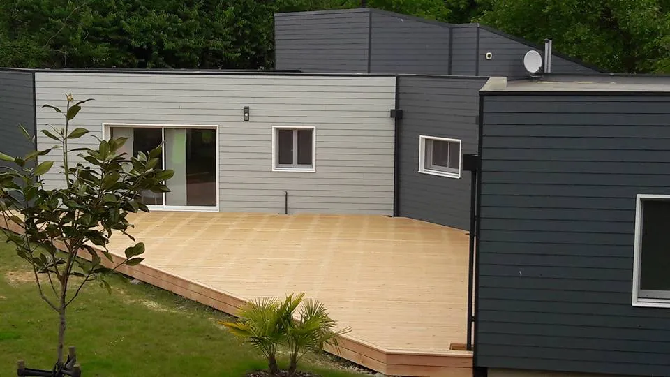 Wooden terrace by a traditional roofing and framework company in Nouvelle-Aquitaine