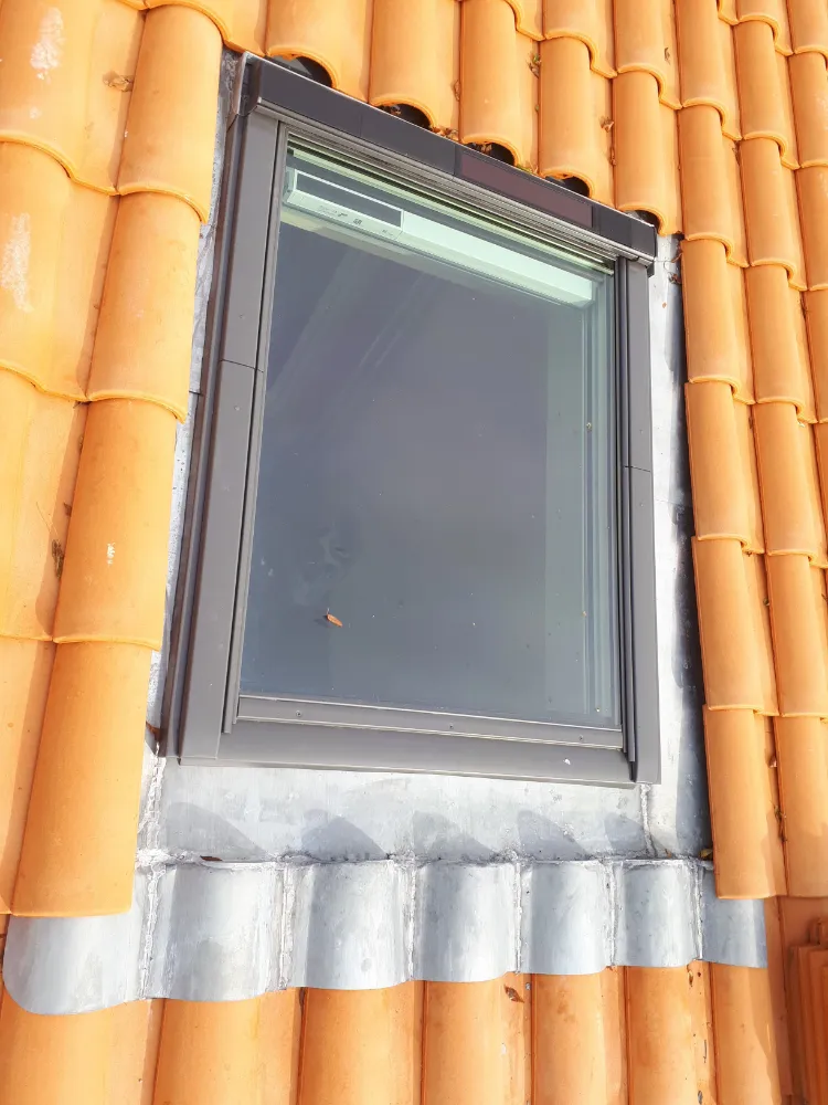 successfully installing a zinc flashing around a Velux window